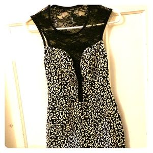 Very sexy tight black and white mini type dress